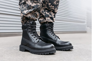 Heavy black leather work boots used, a Person Photo by ZinetroN