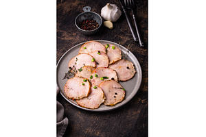 Sliced chicken sausage with herbs, a Food & Drink Photo by Yulia Furman