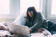 A woman in her 50s working from home containing woman, 50s, and older, a Person Photo by Chelsea Victoria (Thumbnail 1 of 2)