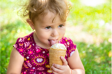 The child eats ice cream on the, a Person Photo by yanadjana