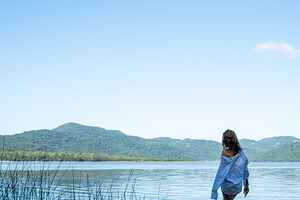 Woman Walking in Lake, a Photo by HiLine
