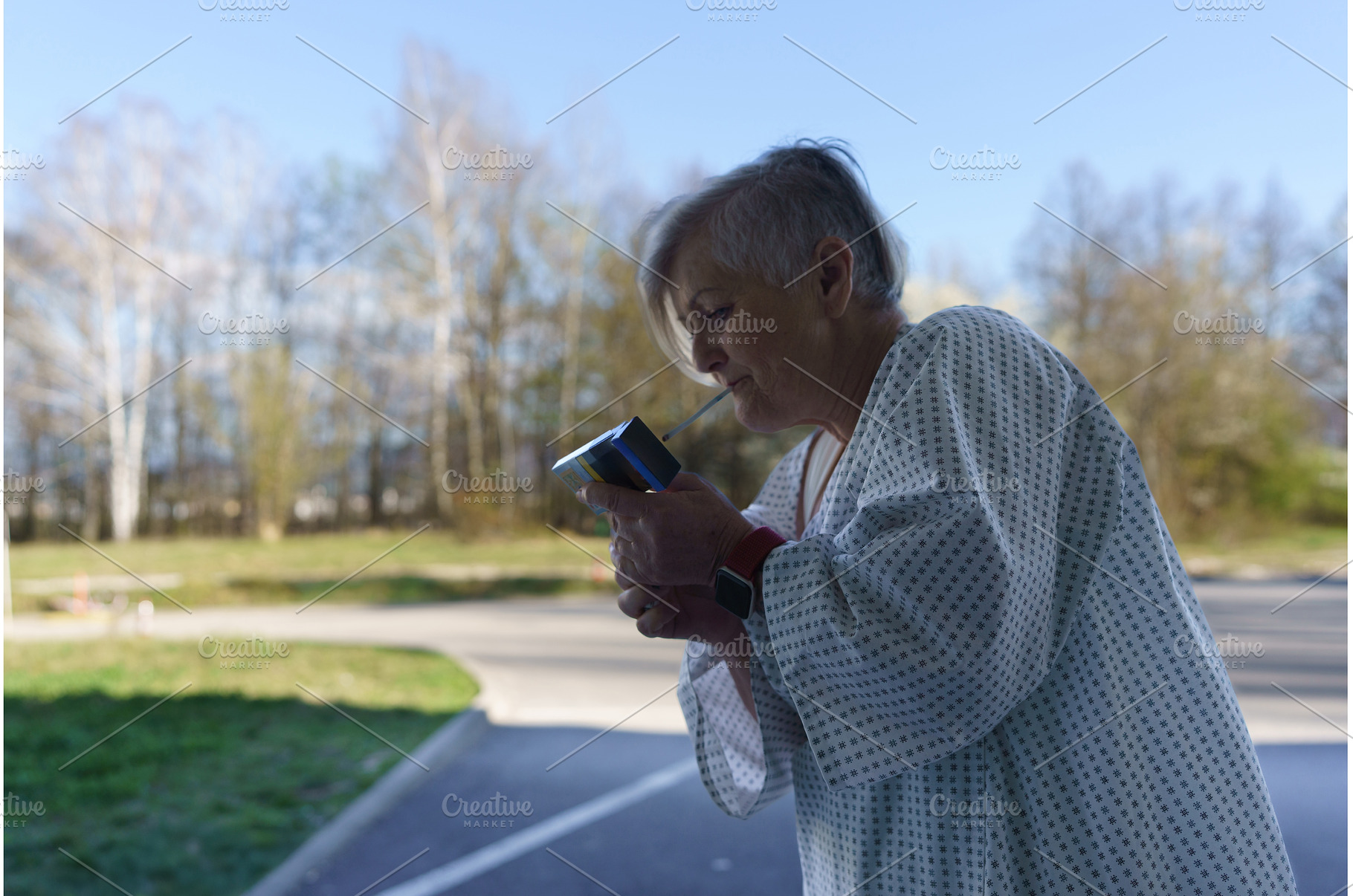 Female patient in hospital gown, a Health & Medical Photo by HalfPoint