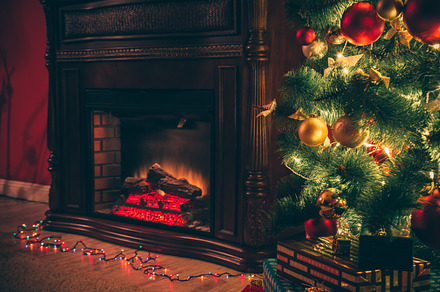Christmas living room containing room, tree, and defocused