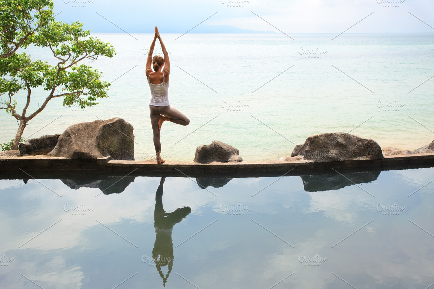 Woman practicing morning meditation yoga at the beach featuring yoga, beach, a Sports & Recreation Photo by Jyliana's shop