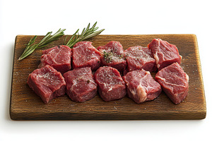 Fresh raw lamb meat in a wooden boar, a Food & Drink Photo by Pixeness Studio