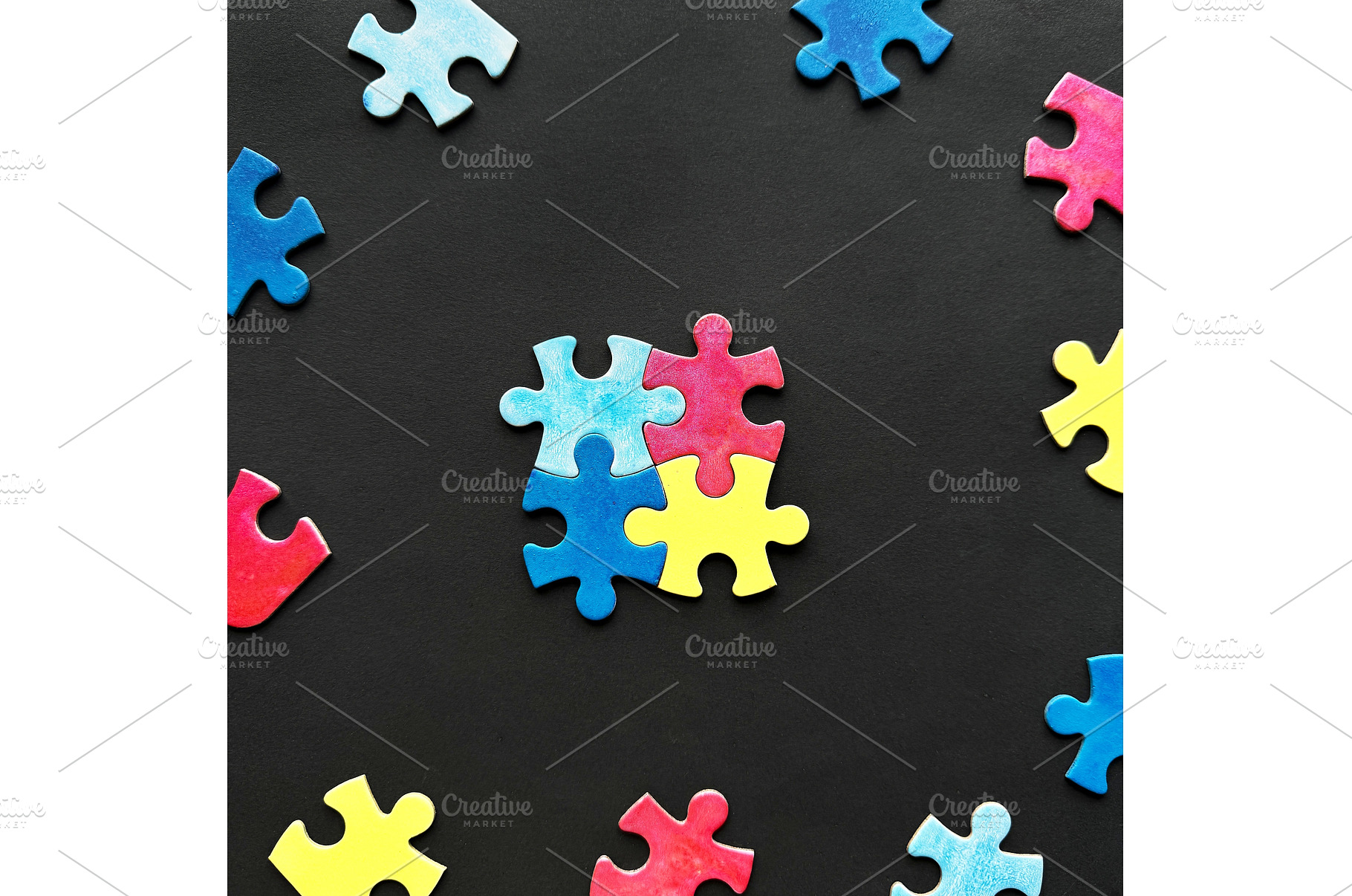 Colorful puzzle pieces arranged on a, a Photo by tilialucida
