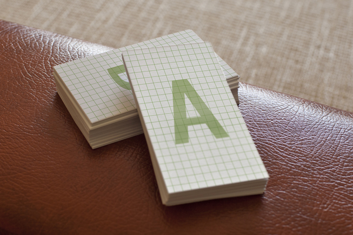 Photorealistic Business Card Mock-Up, a Background Graphic by CleanLines (Photo 1 of 5)