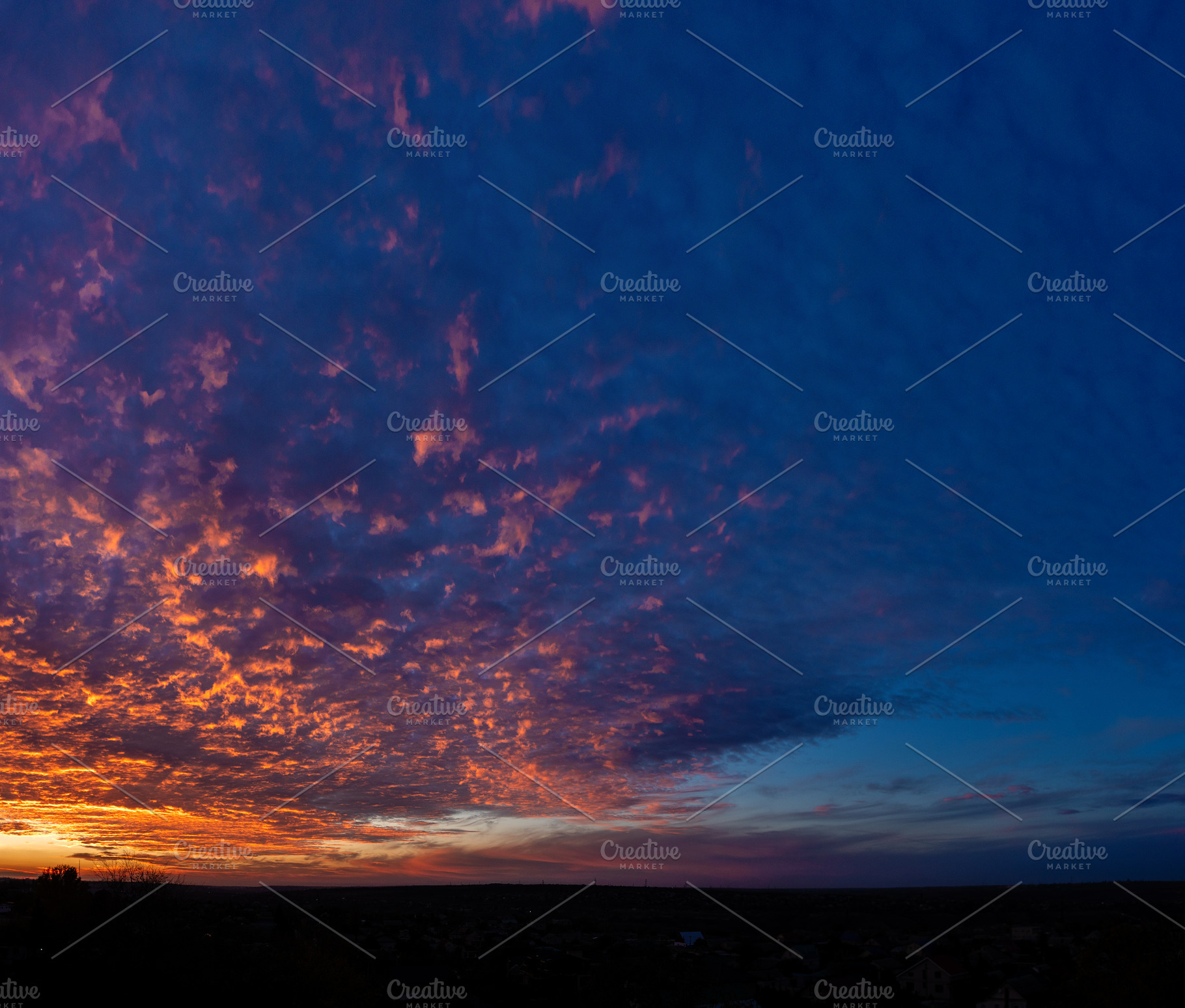 Dramatic blue and orange sunset clou, a Nature Photo by Elena Vagengeim