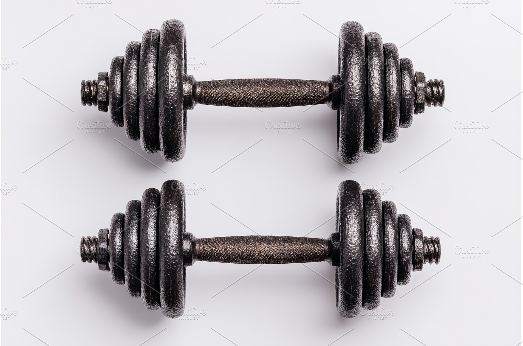 Black color dumbbell used in workout, a Sports & Recreation Photo by ZinetroN