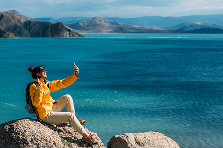 A traveler on the seashore, a Person Photo by SOTNIKOV_MISHA