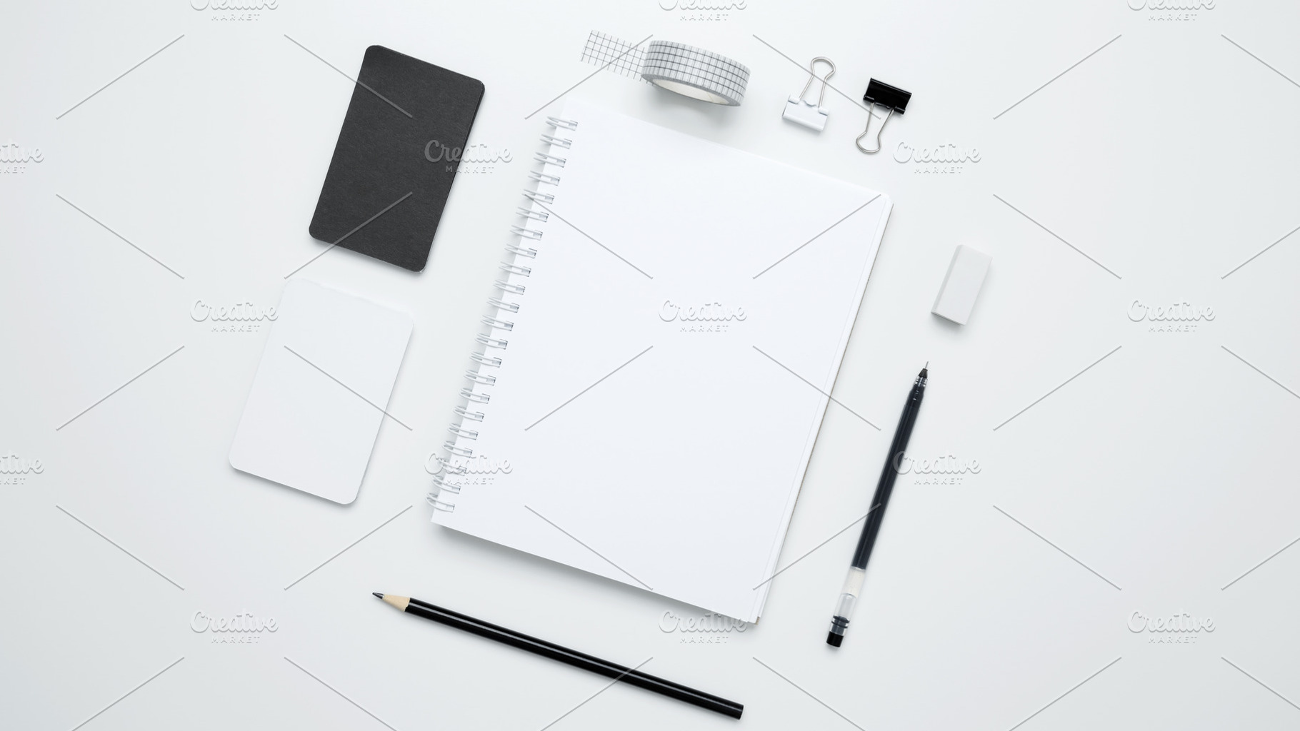 An empty mock up notebook, white and black cards, monochrome stationery items a, a Photo by matucha