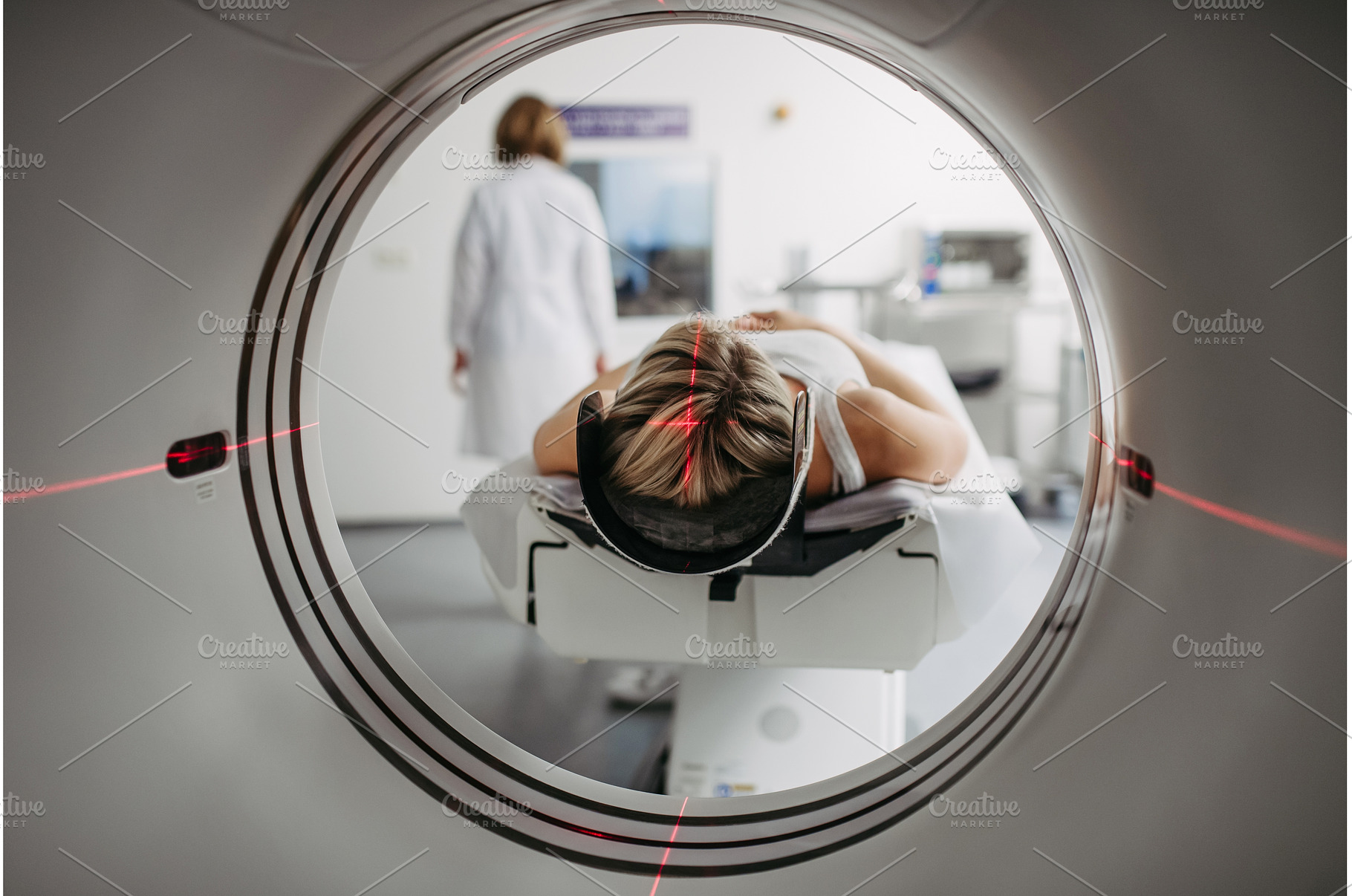 CT scanner view of patient during, a Person Photo by HalfPoint
