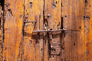 Wooden door close-up view with rusty, an Architecture Photo by GoodGoods