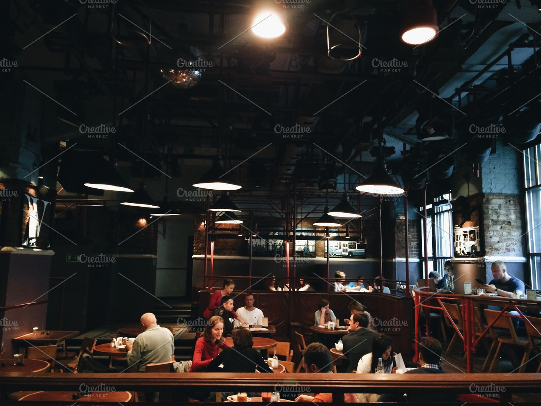 Crowded restaurant setting stock photo containing restuarant and bar, a Food & Drink Photo by cristinalallare