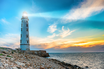Lighthouse at night featuring lighthouse, light, and night, a Nature Photo by Vapi