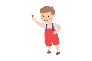 Joyful Little Boy Holding Small Red