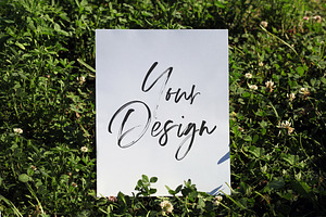 Poster Mockup on Grass