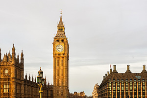 Elizabeth Tower standing tall with Houses of Parliament, iconic London landmark, a Photo by Studio ANNA