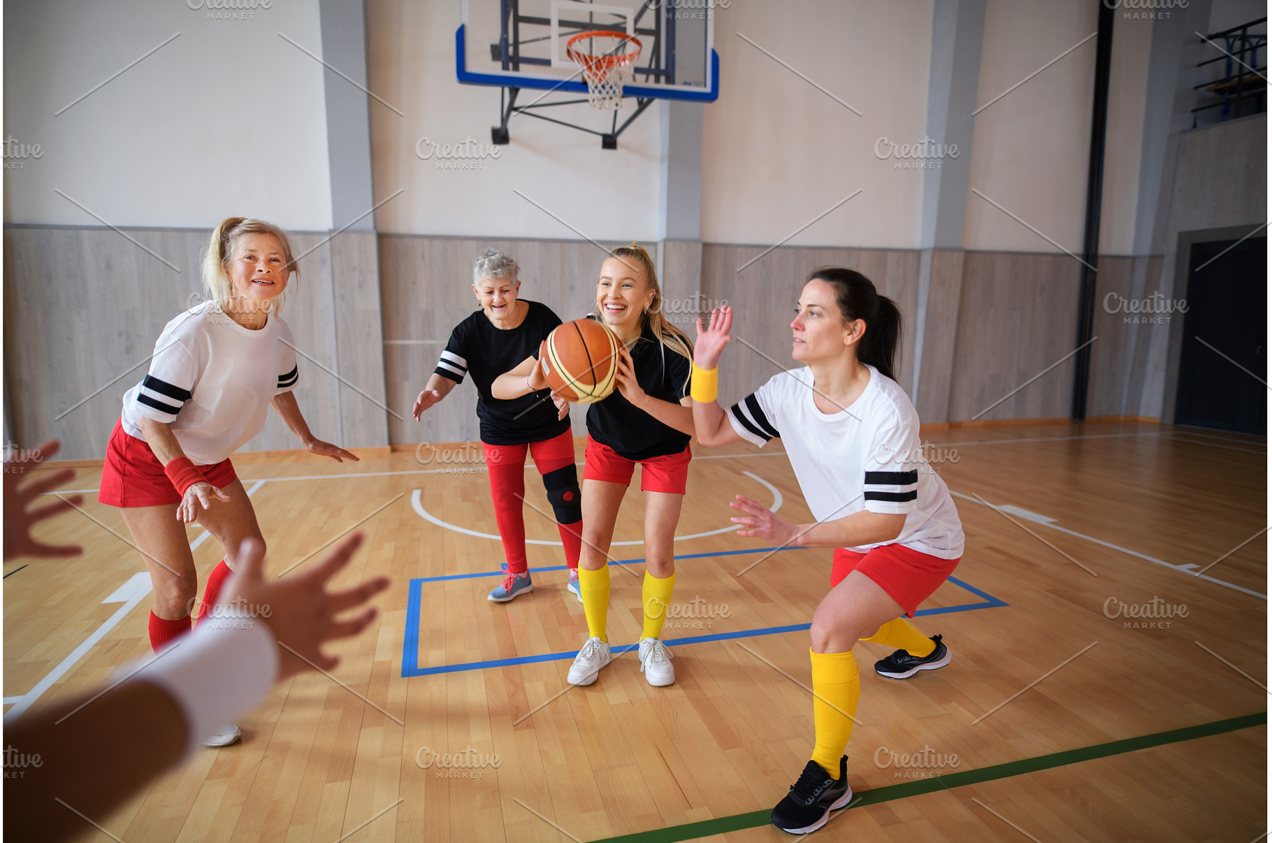 Multigenerational women playing, a Sports & Recreation Photo by HalfPoint
