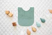 Bib Flatlay Mockup #14, a Product Mockup by JENLYNN Stock Shop (Thumbnail 4 of 8)