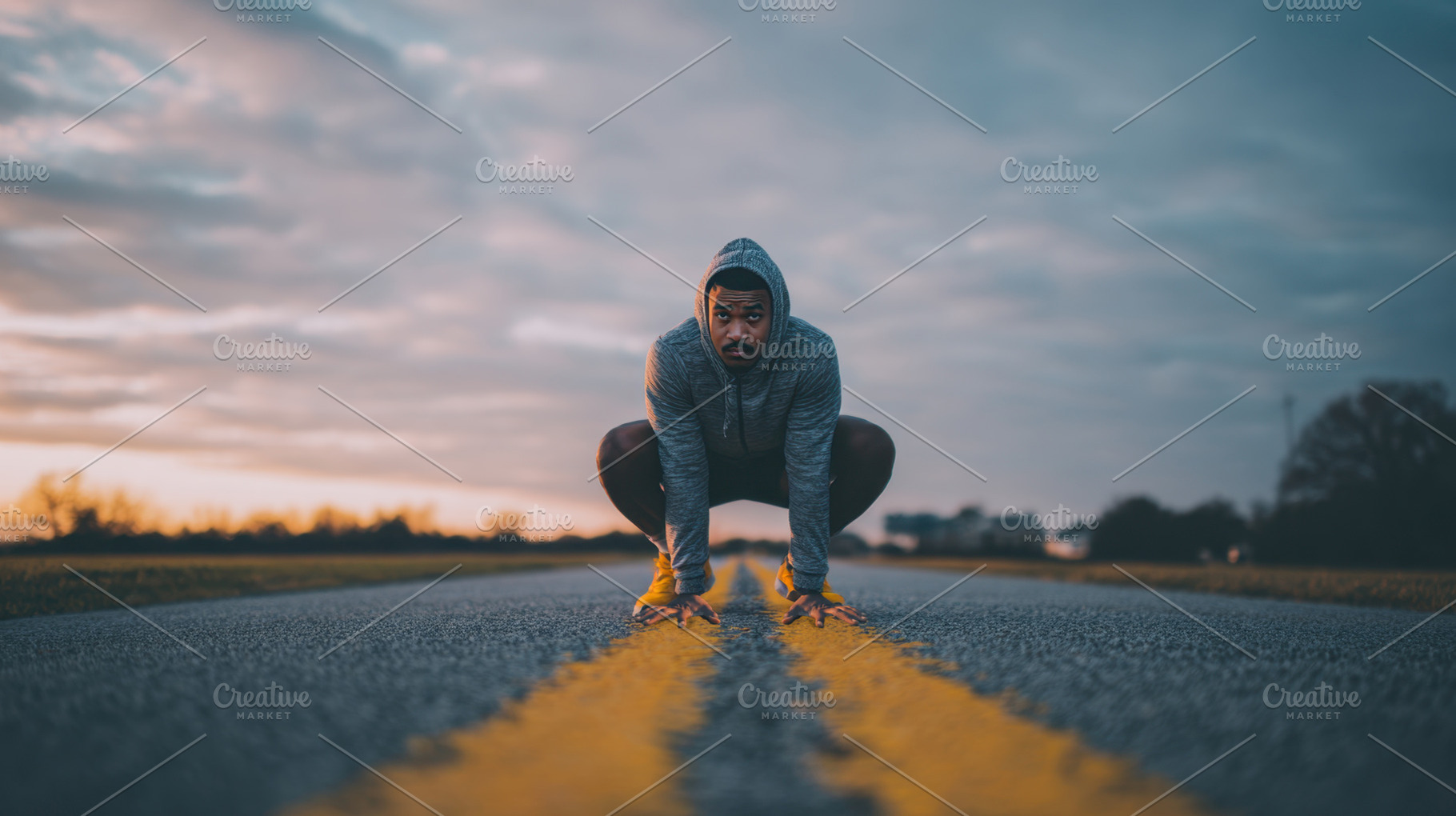 Runner prepares on empty road, a Photo by Beautiful things