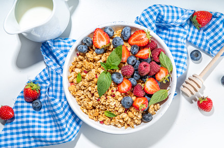 Healthy breakfast granola with berry, a Food & Drink Photo by Rimma