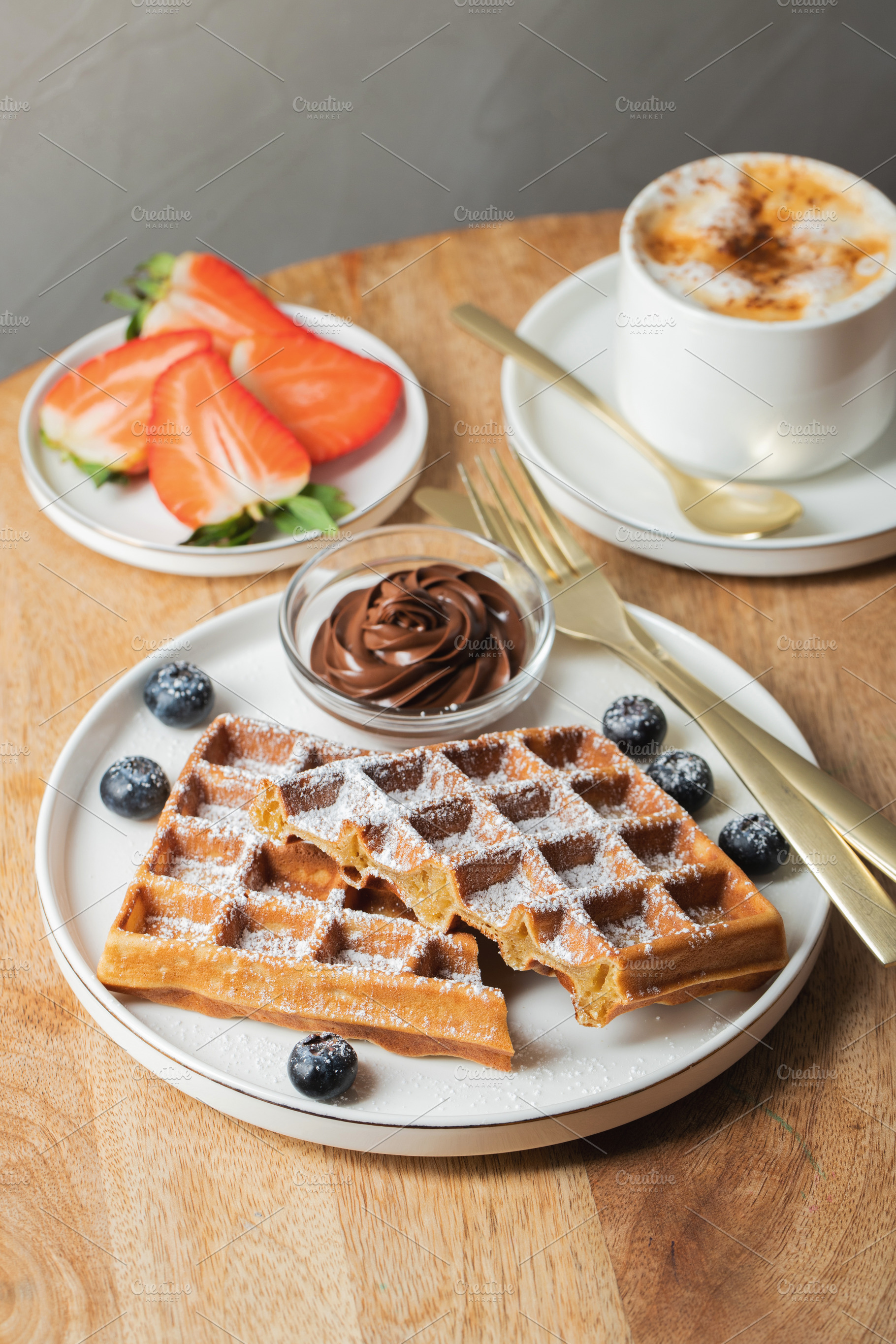 Belgium waffles Homemade waffles with strawberries, a Food & Drink Photo by Budarinphoto