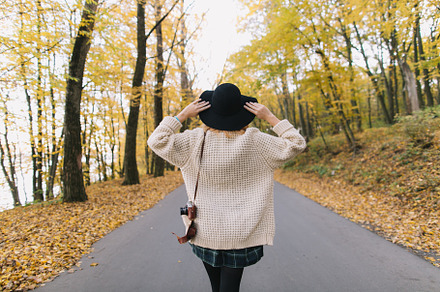 Hippie girl with old camera containing autumn, girl, and park, a Person Photo by Cherkas Photography