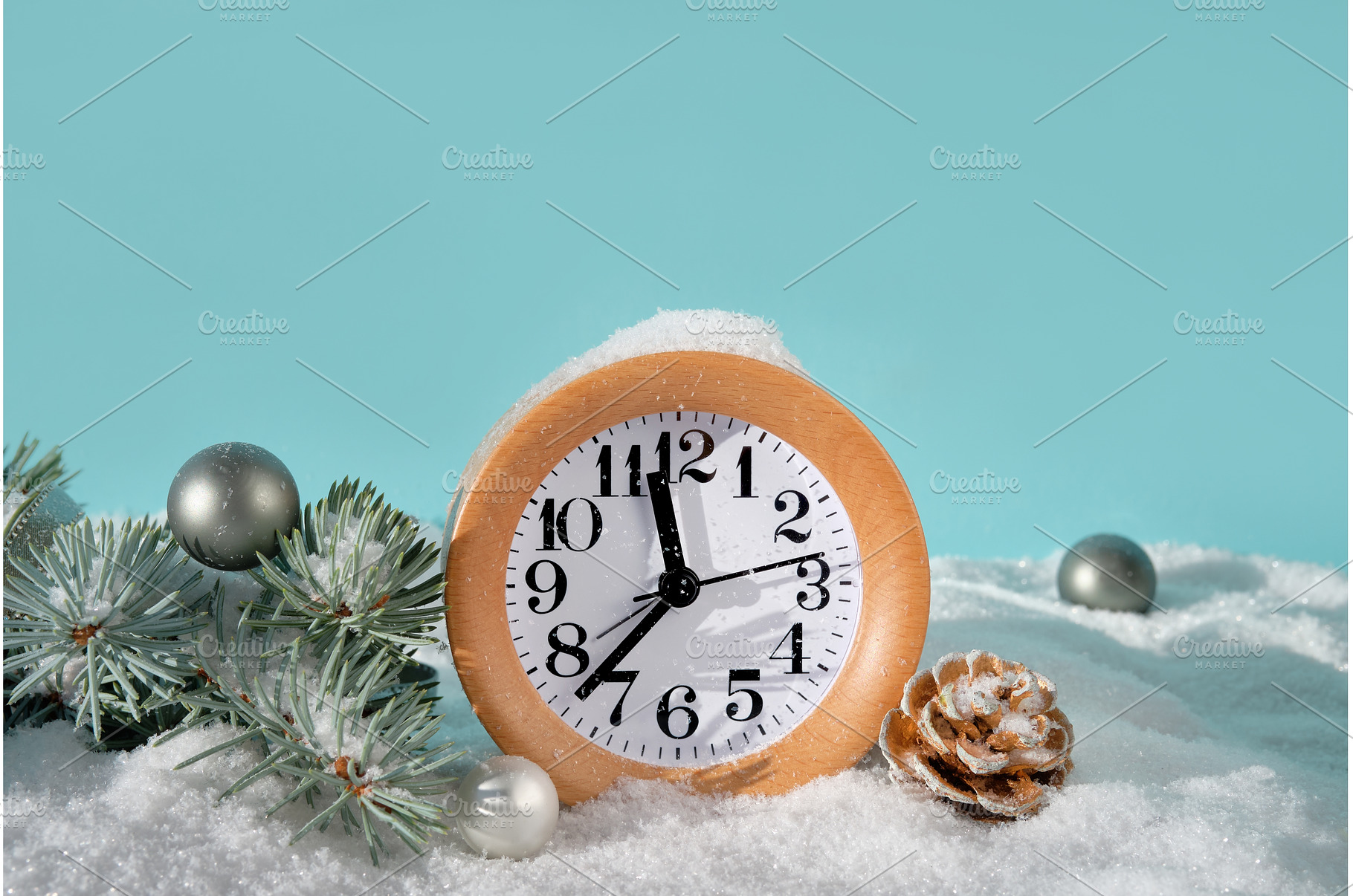 Wood alarm clock with fir twigs, a Holiday Photo by tilialucida