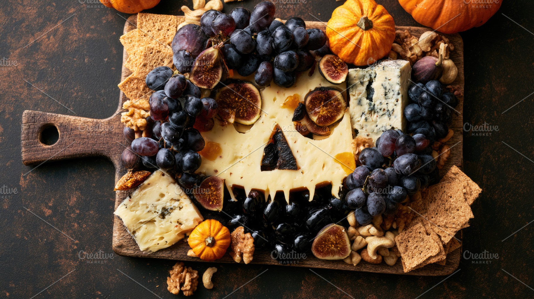 Halloween charcuterie board with spooky cheese face, a Food & Drink Photo by José Manuel Gelpi