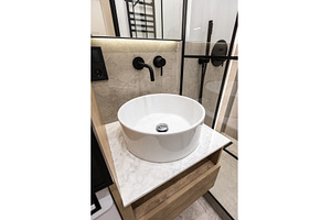 Modern bathroom sink with black wall, an Architecture Photo by wip3out