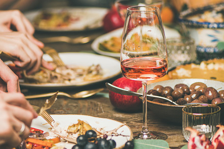 Friends or family eating at festive stock photo containing traditional and, a Food & Drink Photo by Foxys