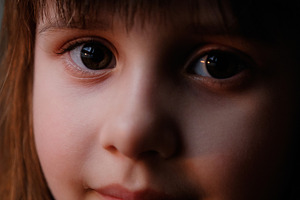 Close-up Portrait of a Sweet Little Girl with Brown Eyes., a Person Photo by Rohan Photography