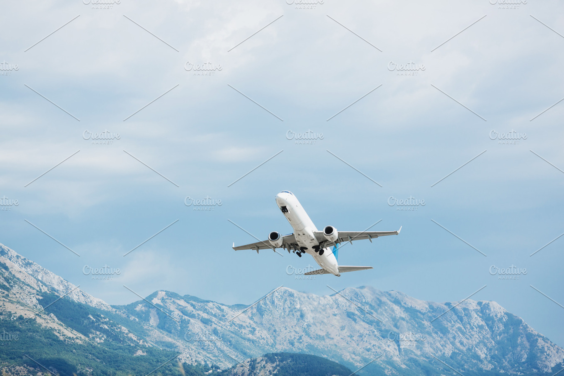 Airplane take off. Mountains view., a Transportation Photo by odpium