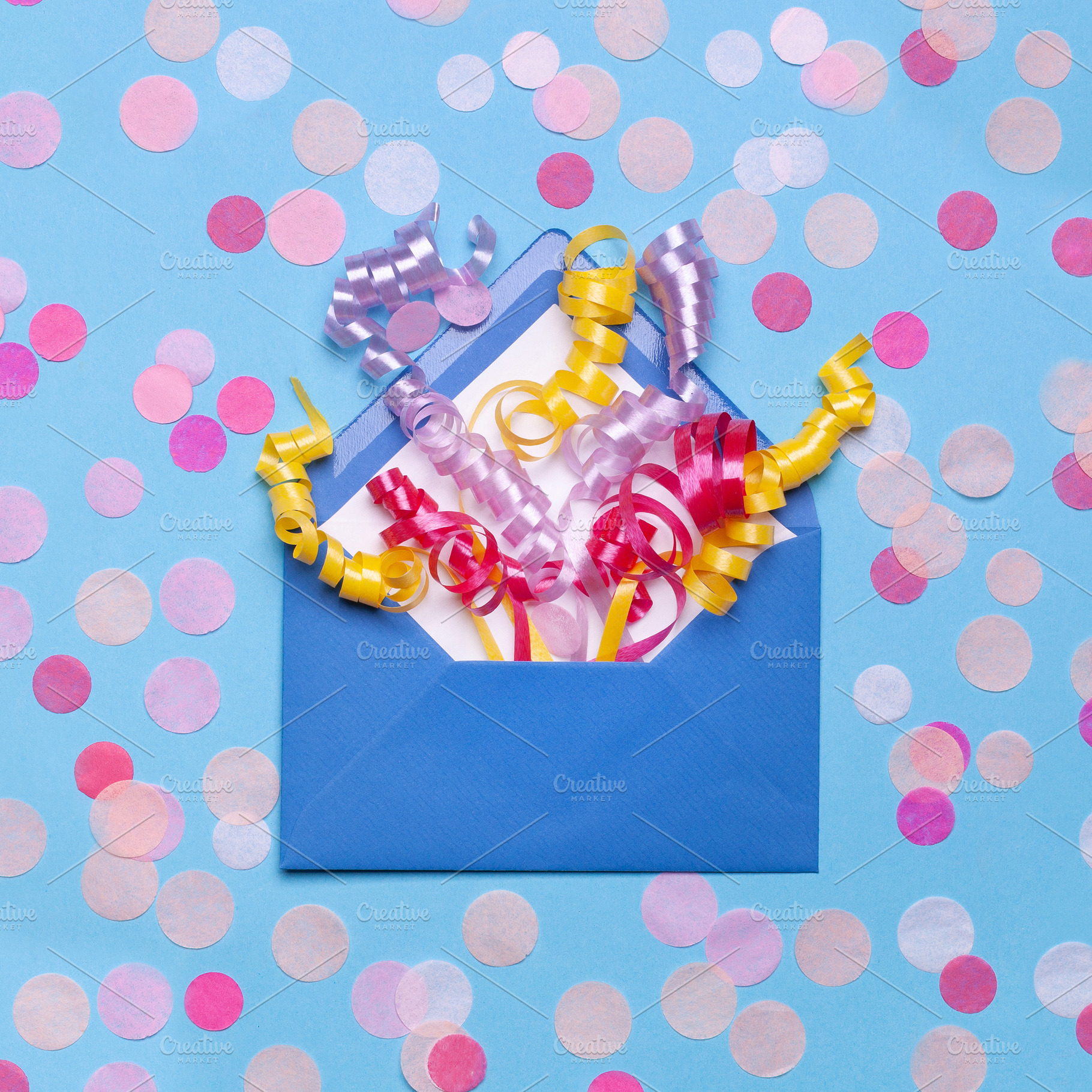 Gift envelope with confetti containing decoration, greeting, and envelope, an Abstract Photo by Alim Yakubov