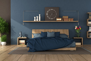 Blue modern bedroom with wooden double bed