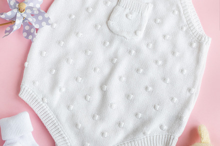 Set of white clothes and accessories for newborn baby. Knitted t, a Beauty & Fashion Photo by Olena Rudo