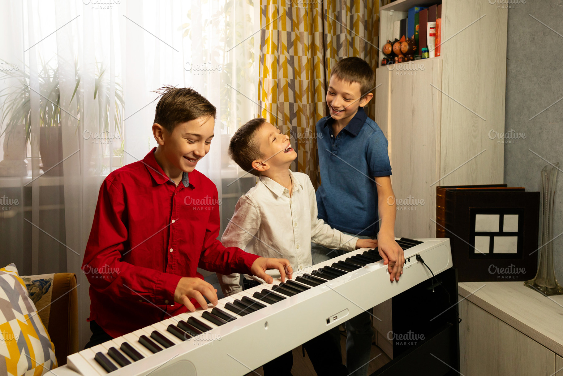 Group boys playing the piano, a School & Education Photo by Elena Vagengeim