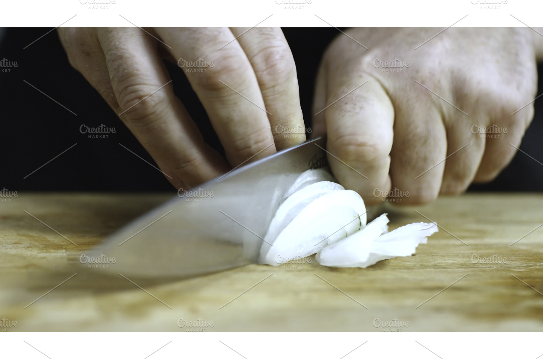 Close-up of man hands cutting white, a Food & Drink Photo by Media Whale Stock