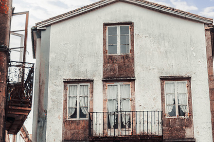 Old Spanish building with balconies, an Architecture Photo by SkyNext