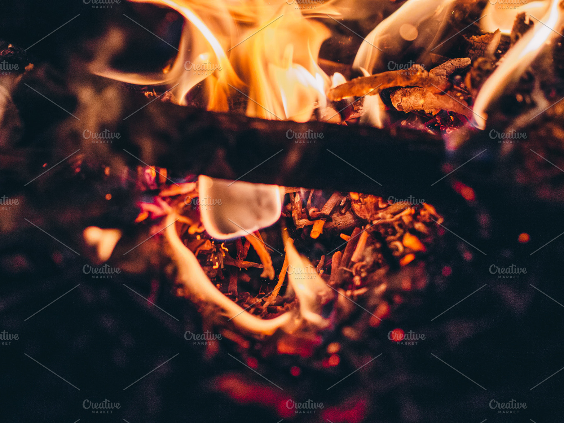 Fire ember containing fire, ember, and wood, an Abstract Photo by Pawel Kadysz