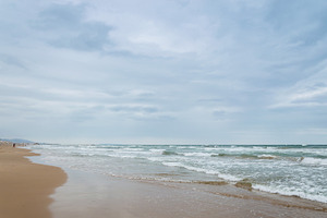 Cloudy summer beach stock photo containing cloudy and summer, a Holiday Photo by Architect´s eye
