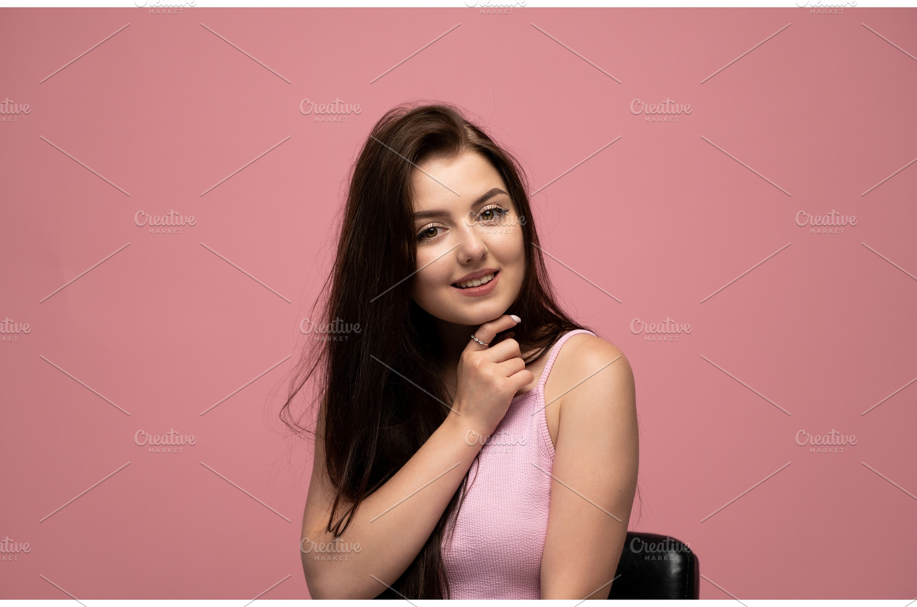 Young woman smiling, looking at, a Person Photo by volodymyrshtun13795