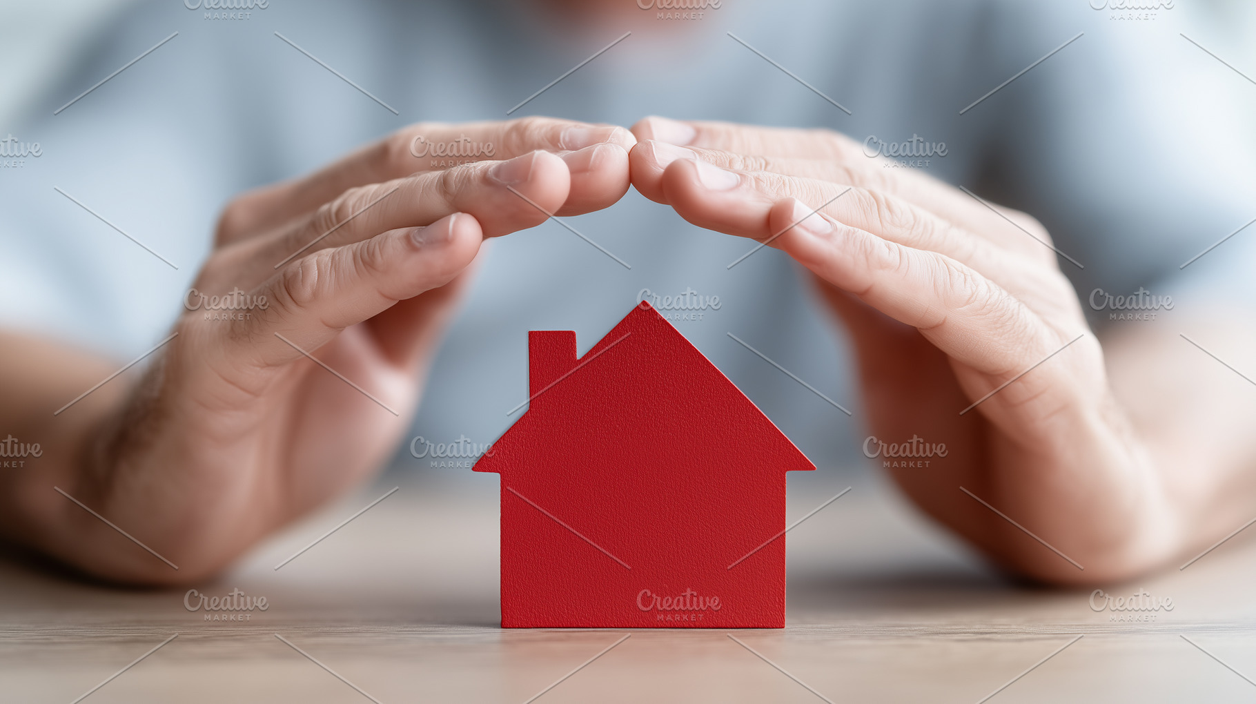 Hands protectively covering a house, a Business Photo by MistyDay