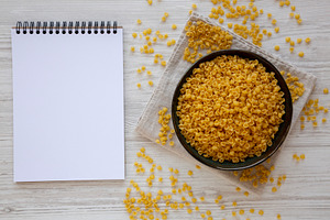Homemade Perlini Pasta in a Bowl, top view. Flat lay, overhead,, a Food & Drink Photo by LiudmylaChuhunova