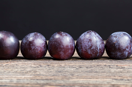 red homemade plums during cooking, a Photo by MyPhotos