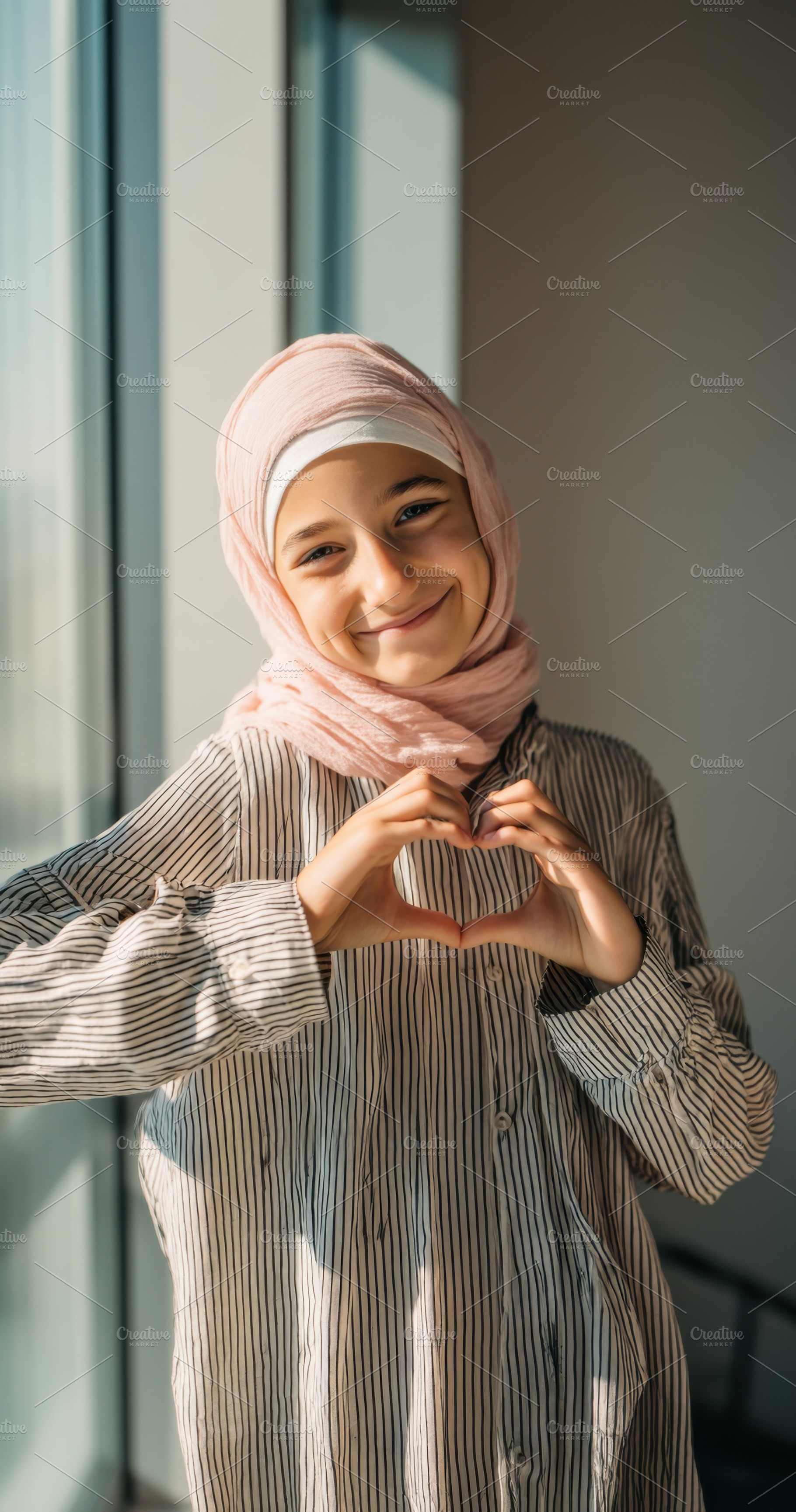 Smiling Muslim Girl Wearing Hijab, a Person Photo by Virgo Studio