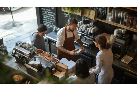 Small Business Owner Assisting