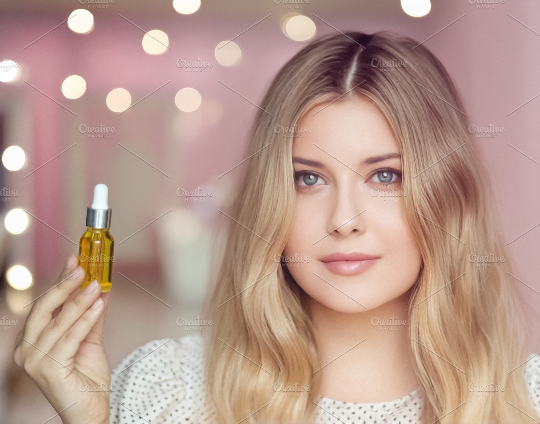 Woman holding a dropper bottle with natural skincare oil, promot, a Person Photo by Studio ANNA