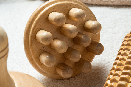 Anti-Cellulite Maderotherapy Instruments on White Table